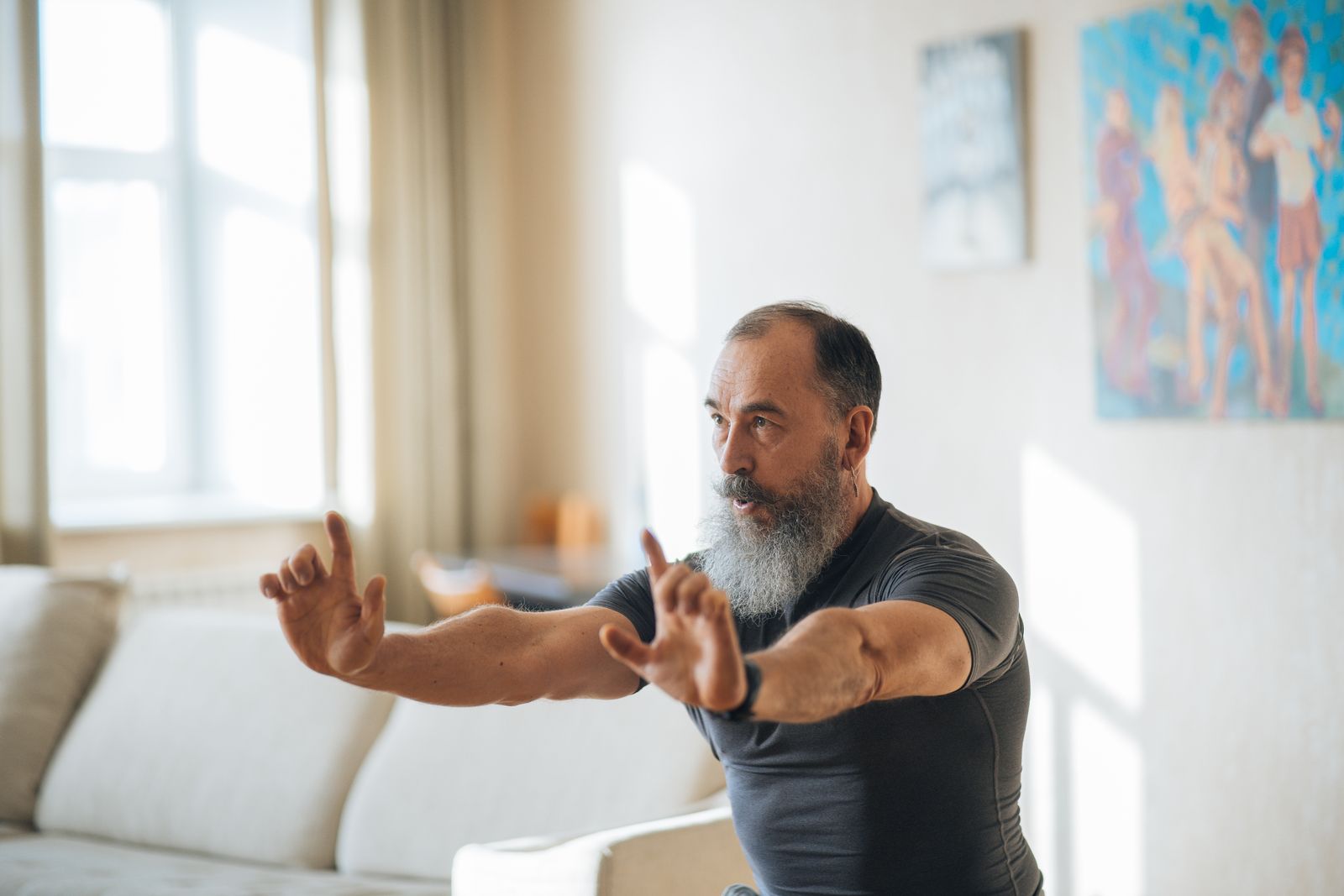 Man following a morning stretching routine